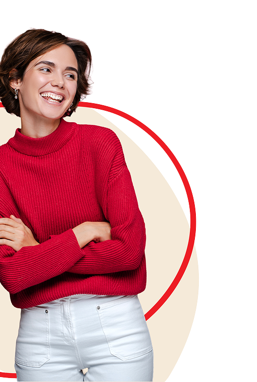 woman smiling in red sweater