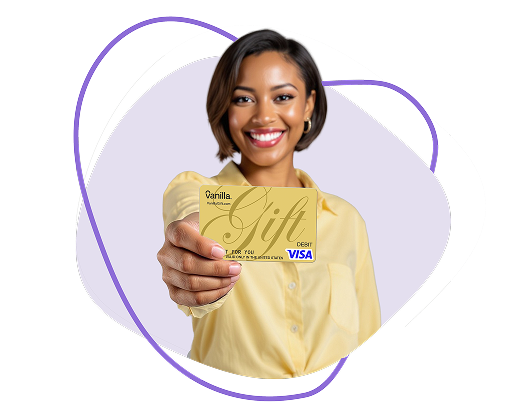 woman smiling and holding a gold Visa gift card